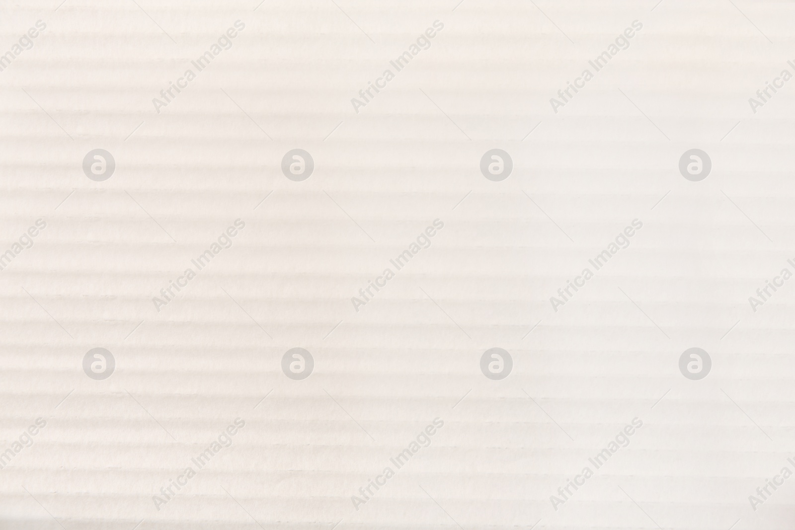 Photo of Texture of white paper sheet as background, closeup