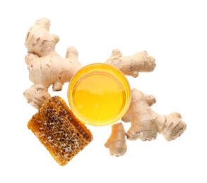 Photo of Ginger and honey on white background, top view. Natural cold remedies