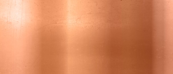 Image of Shiny bronze surface as background, closeup view