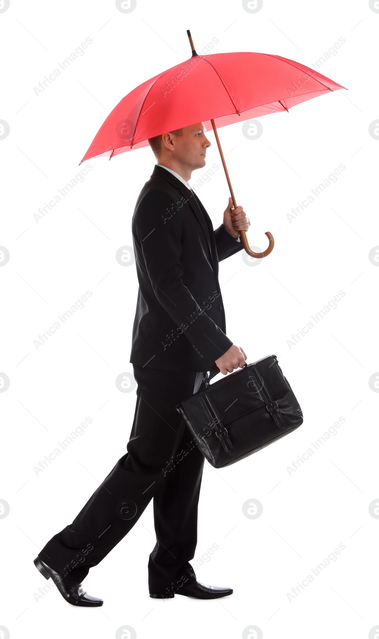 Photo of Businessman with red umbrella on white background