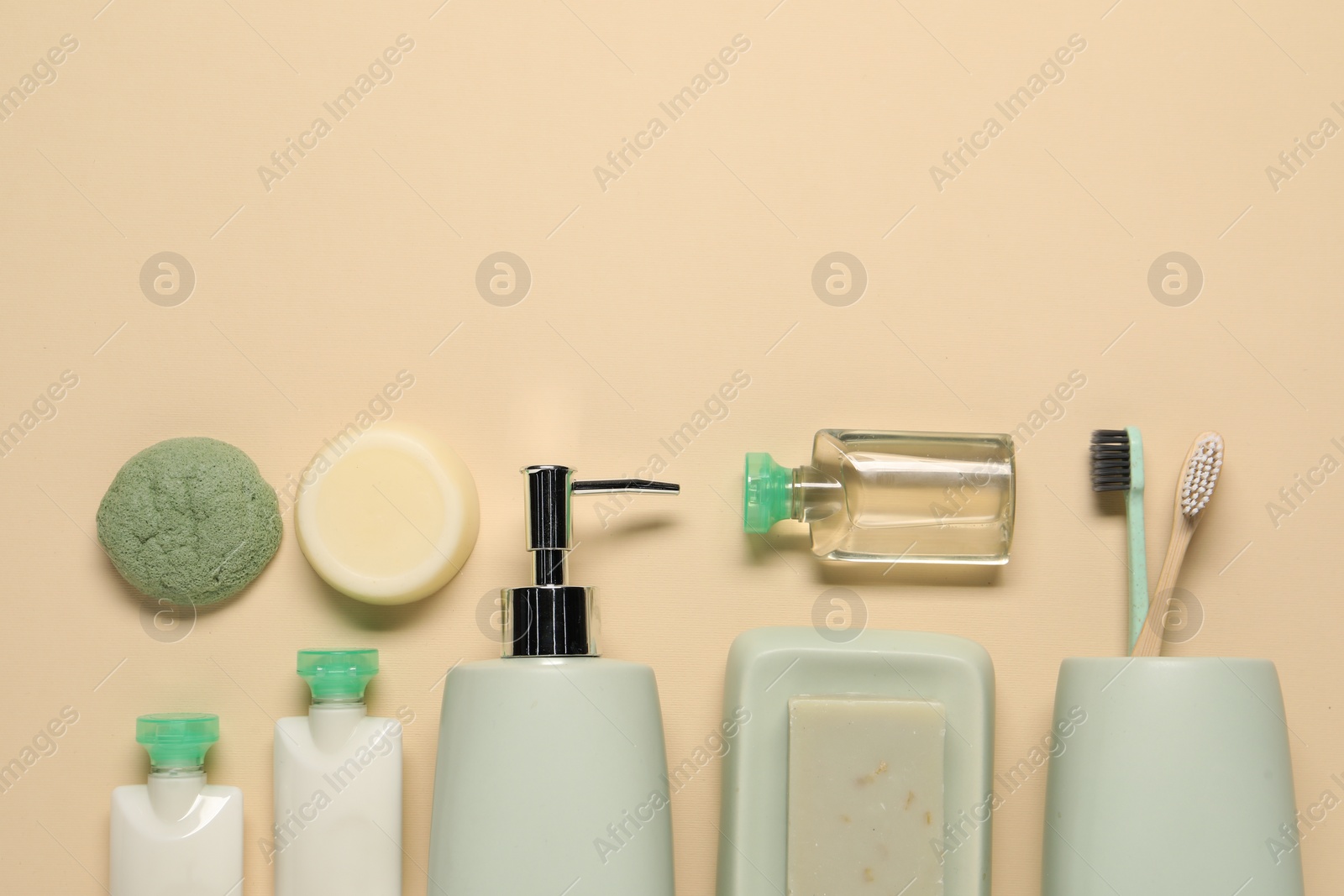 Photo of Bath accessories. Flat lay composition with personal care products on beige background, space for text