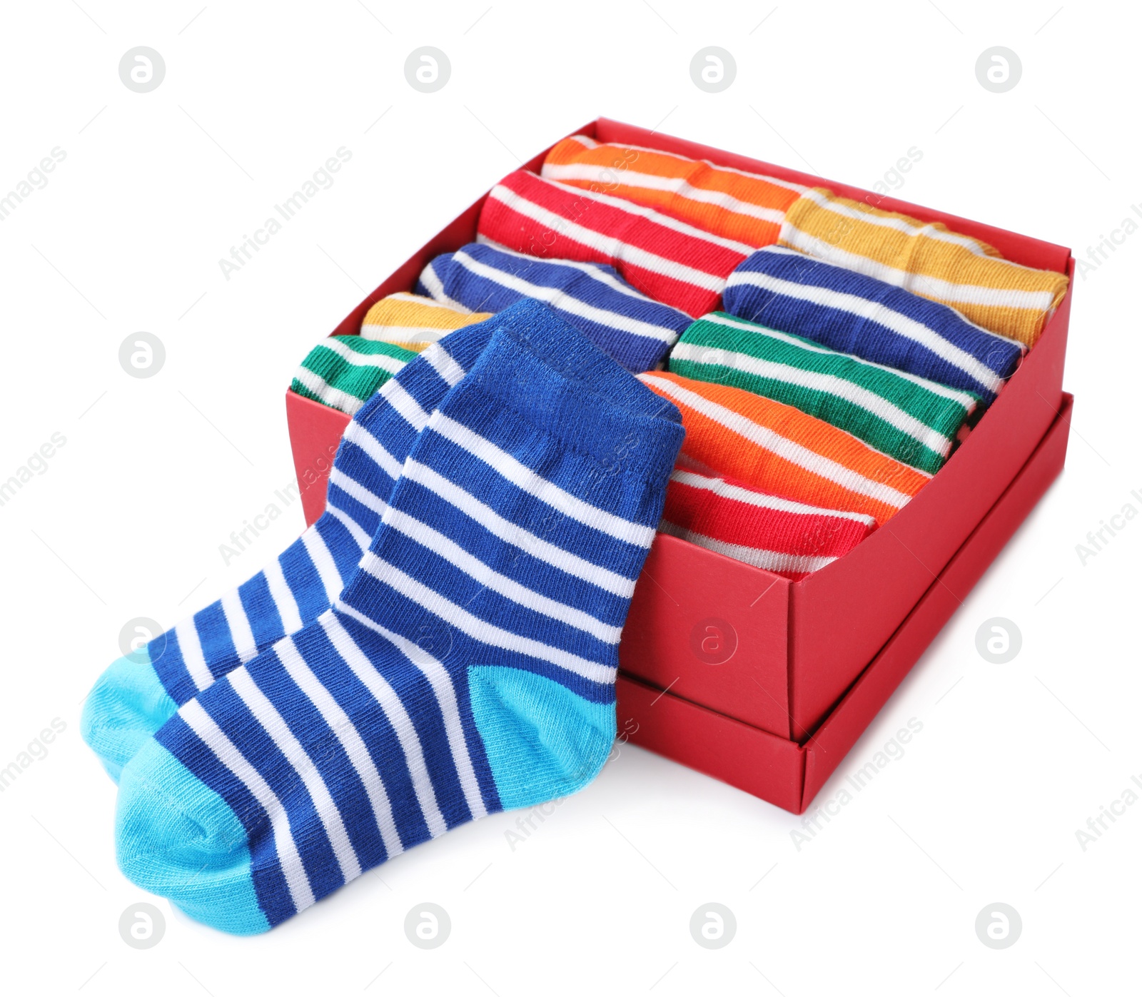 Photo of Box with cute child socks on white background