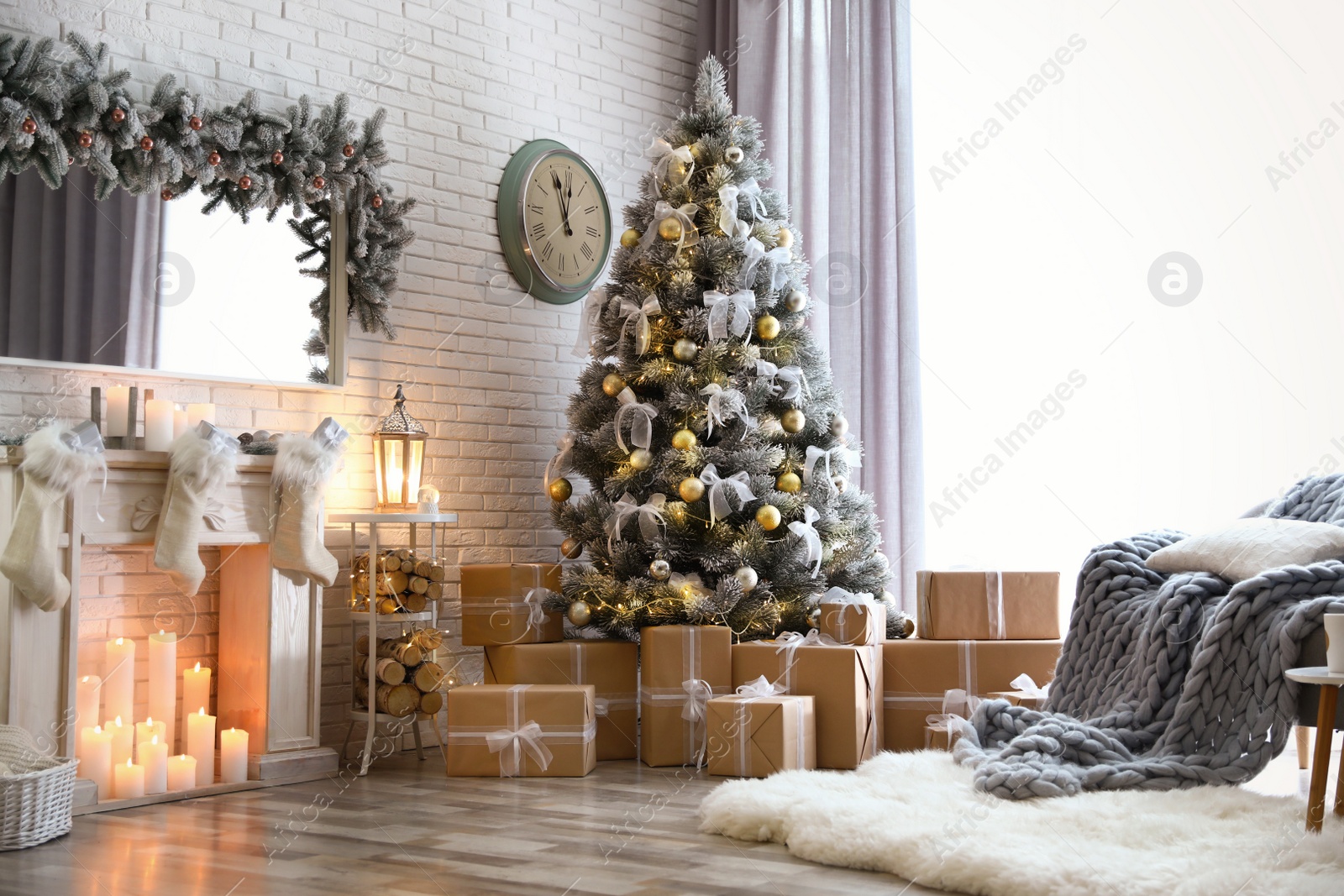 Photo of Stylish interior of living room with decorated Christmas tree