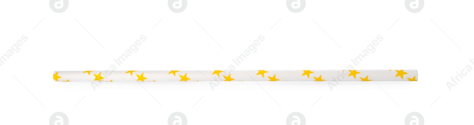 Photo of One paper straw with yellow stars for drinking isolated on white