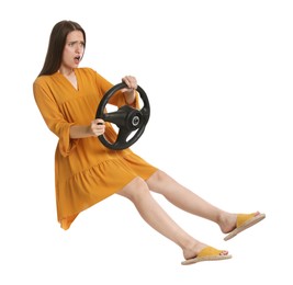 Photo of Emotional woman with steering wheel against white background