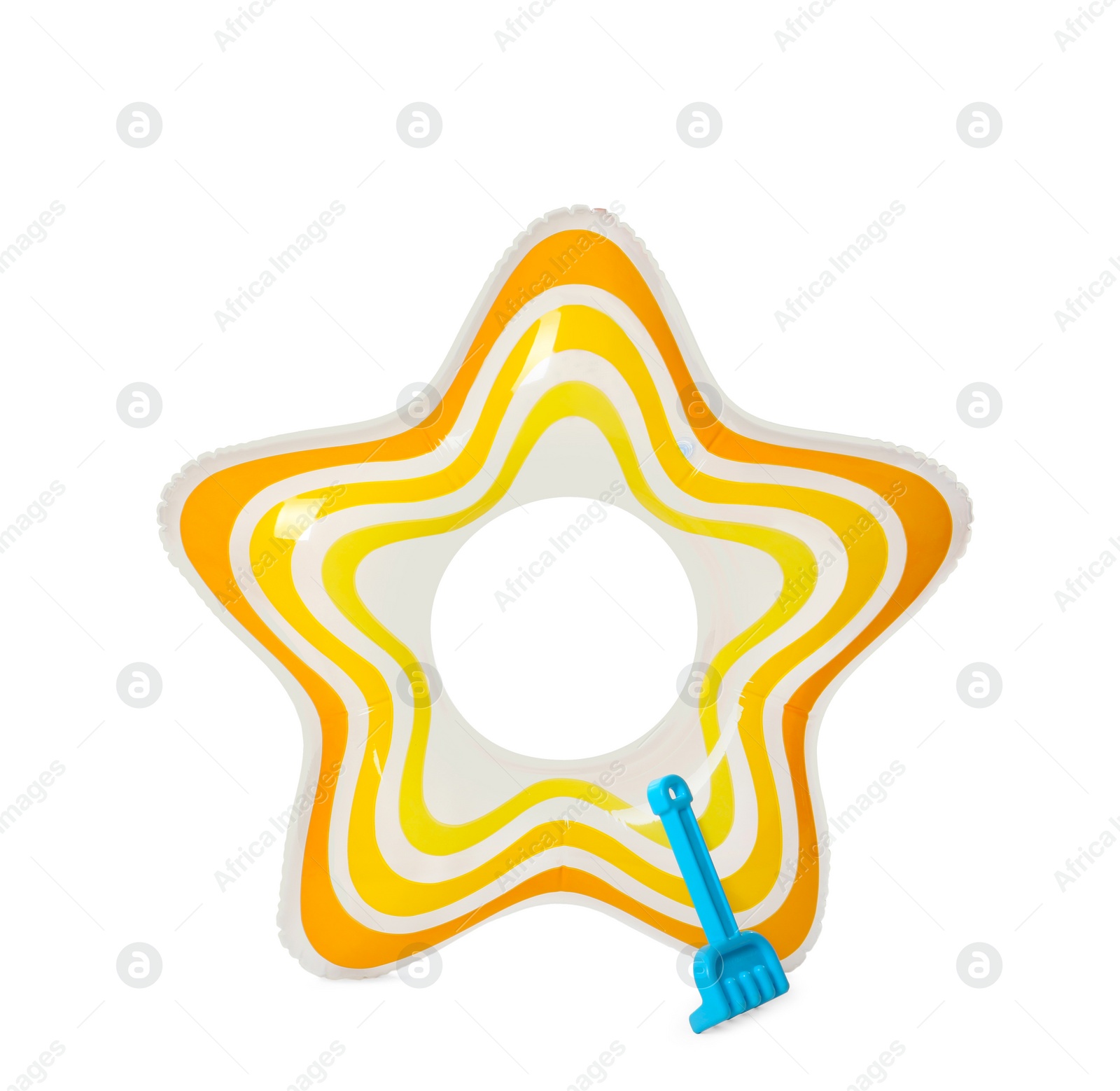 Photo of Inflatable ring and child rake on white background. Summer holidays