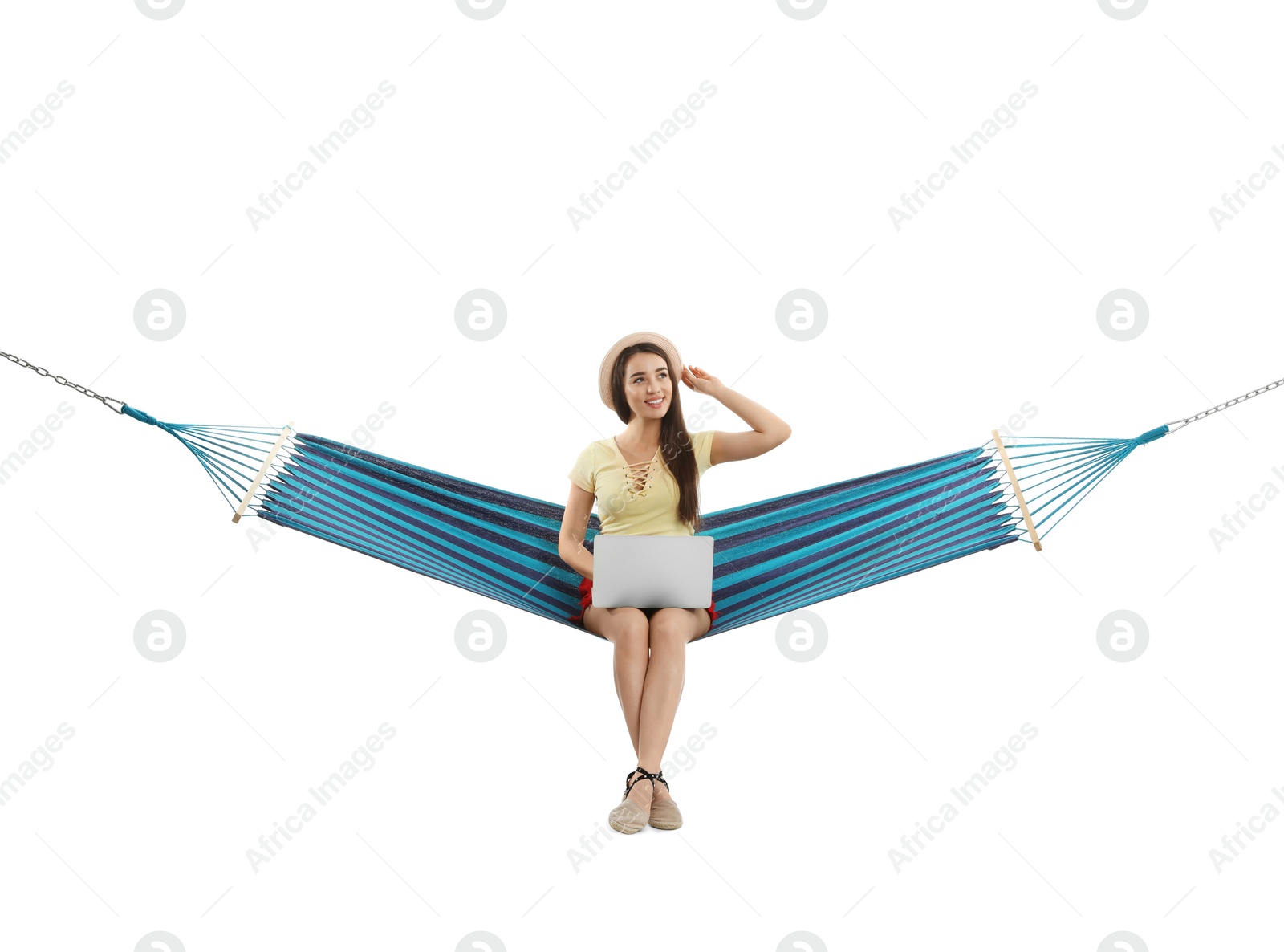 Photo of Woman with laptop in hammock on white background