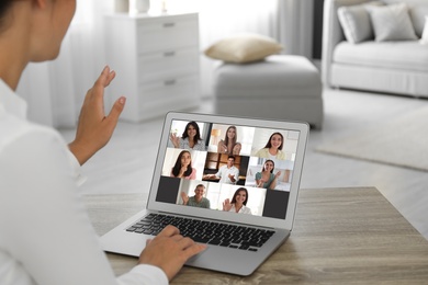 Image of Coworkers working together online. Woman using video chat on laptop, closeup