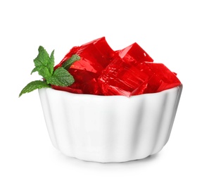 Photo of Bowl with red jelly cubes on white background