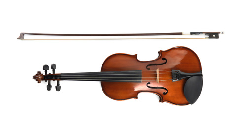 Beautiful classic violin and bow  on white background, top view. Musical instrument