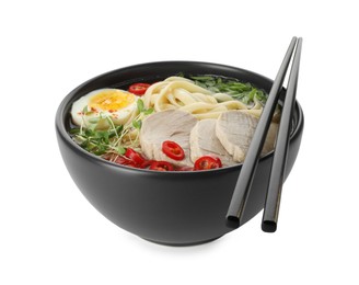 Photo of Delicious ramen with meat and egg in bowl isolated on white. Noodle soup