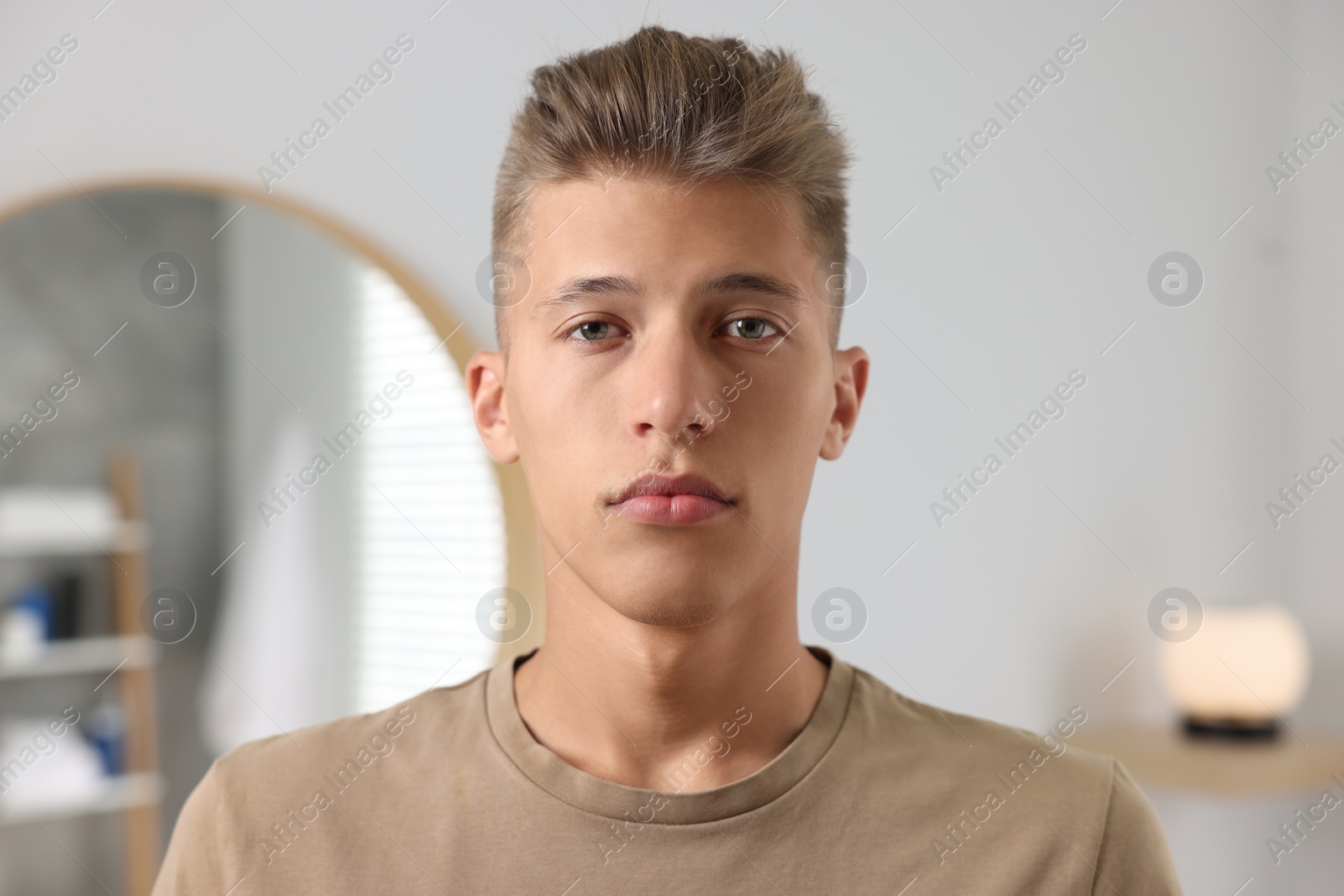 Photo of Portrait of handsome young man at home