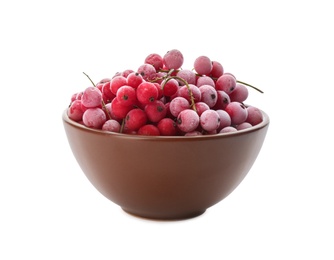 Tasty frozen red currants in bowl on white background