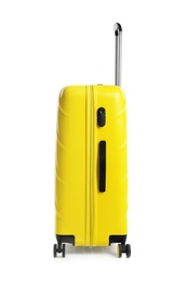 Yellow suitcase for travelling on white background