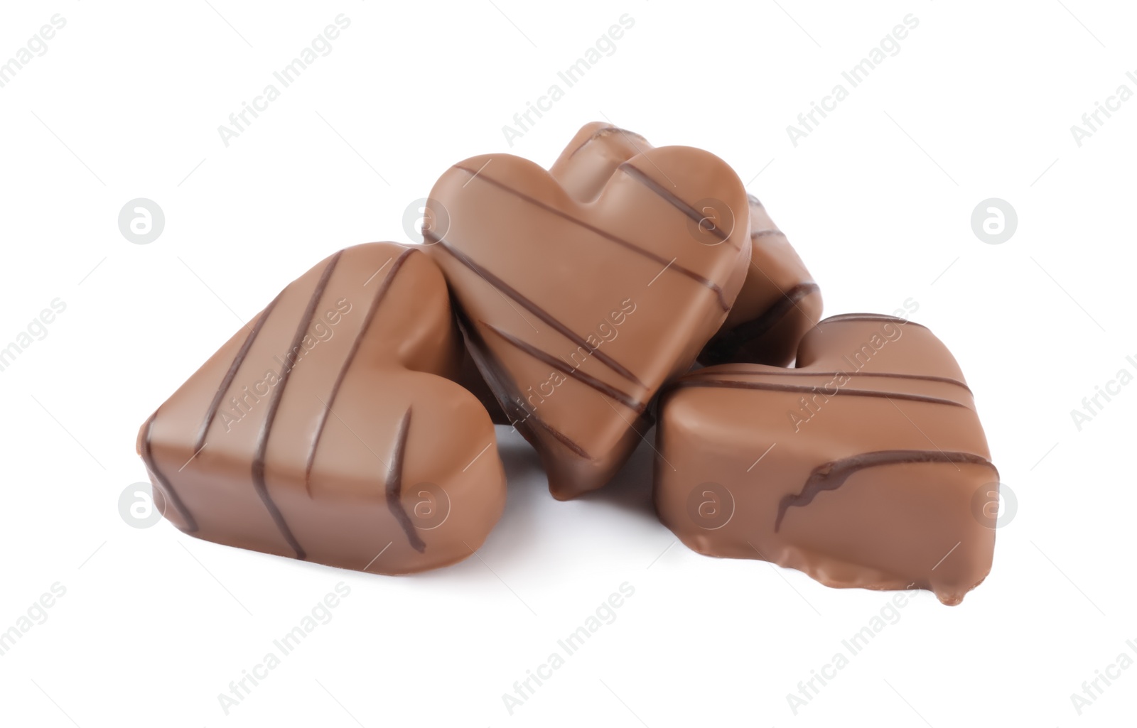 Photo of Beautiful heart shaped chocolate candies on white background