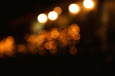 Photo of Beautiful street lights at night. Bokeh effect