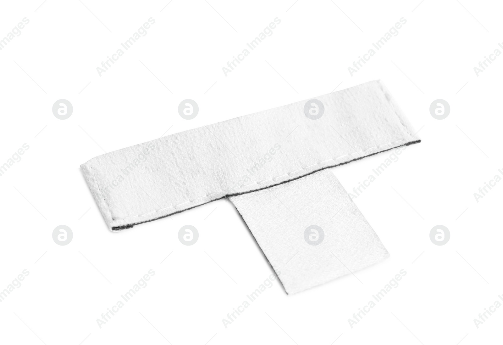 Photo of Blank stylish clothing label isolated on white