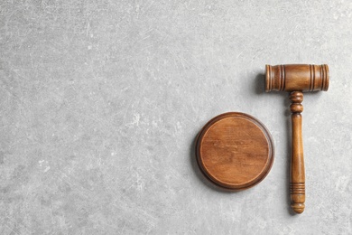 Judge's gavel on light background, top view. Law concept