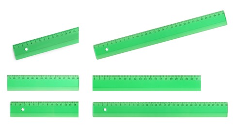 Image of Set with different rulers with measuring length markings in centimeters on white background