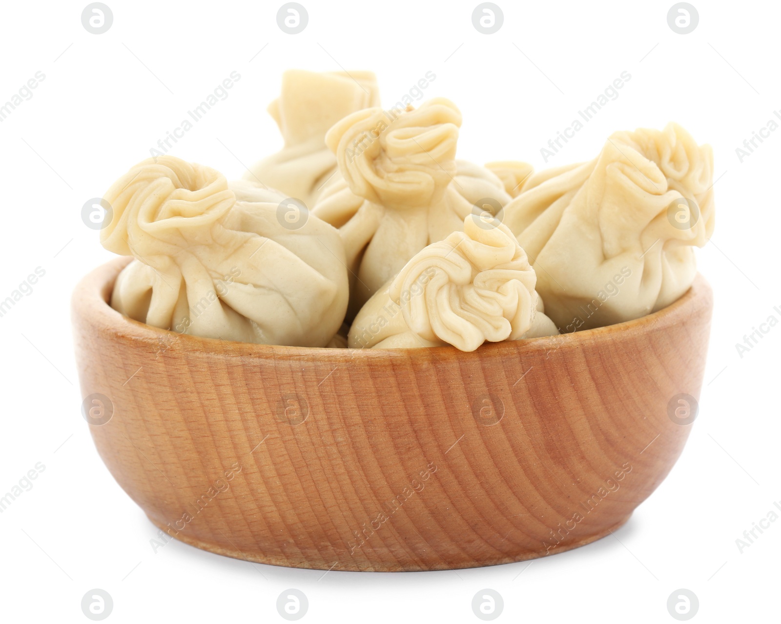 Photo of Bowl with tasty dumplings isolated on white