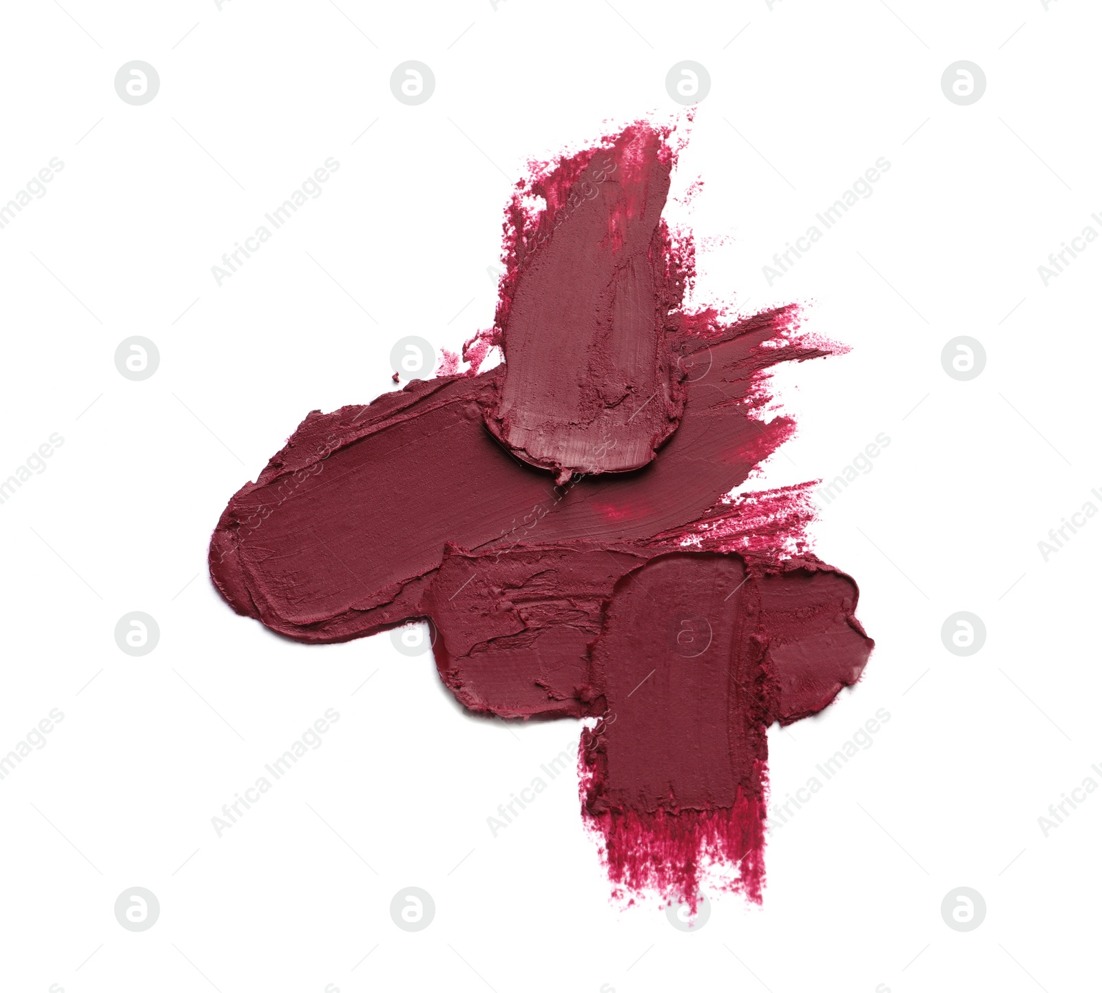 Photo of Smears of beautiful lipstick on white background, top view