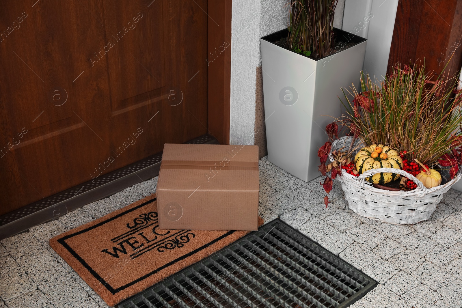 Photo of Parcel delivered on mat near front door