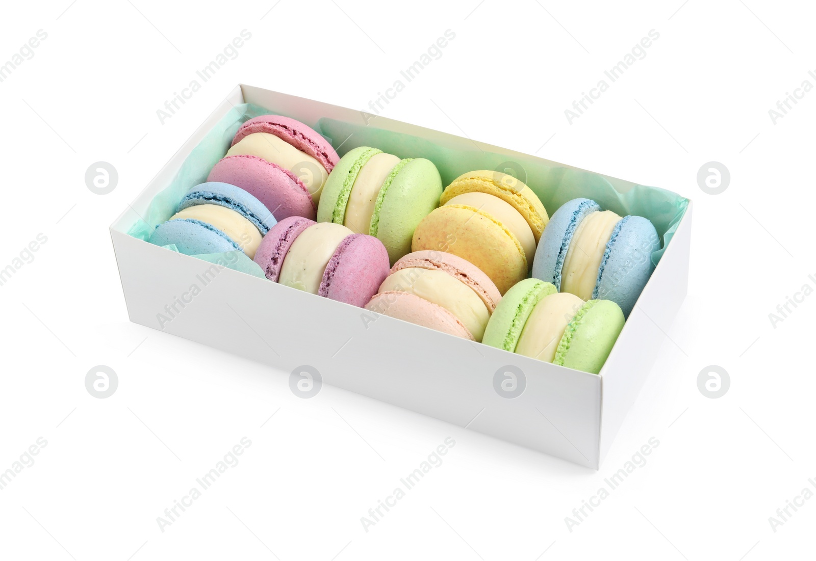 Photo of Many delicious colorful macarons in box on white background