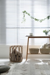 Photo of Stylish room decorated with beautiful eucalyptus garland