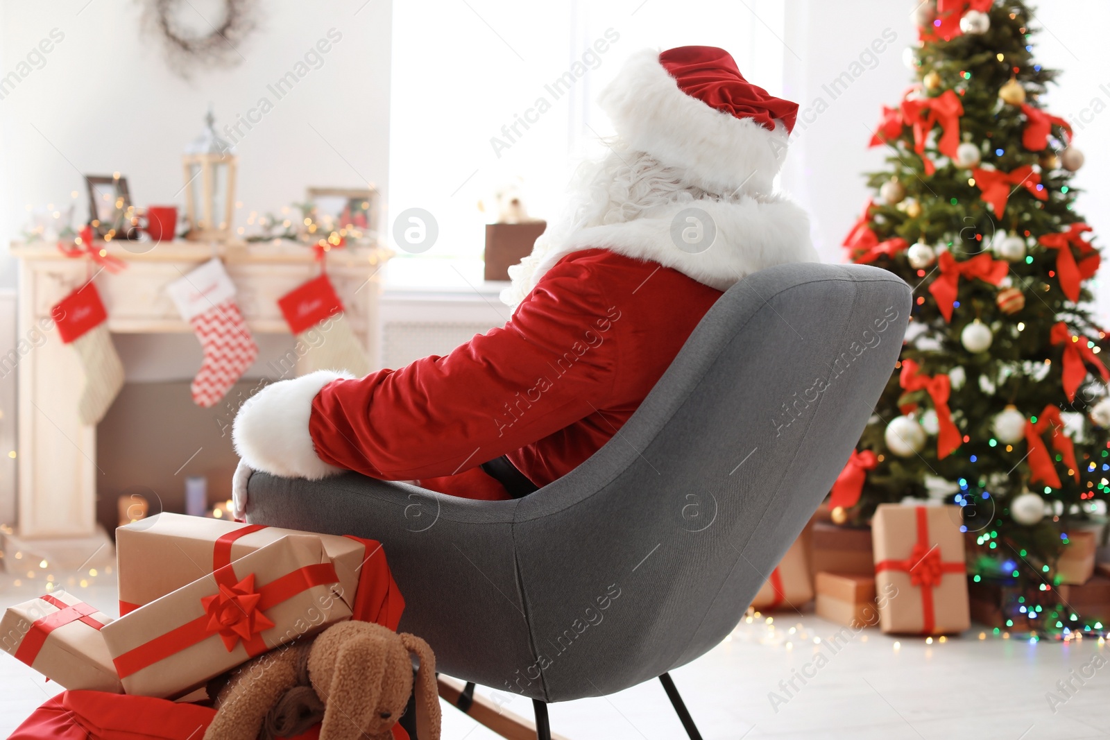 Photo of Authentic Santa Claus in traditional costume indoors