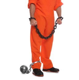 Photo of Prisoner in jumpsuit with chained hands and metal ball on white background, closeup
