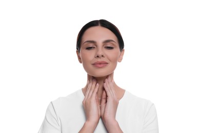 Photo of Endocrine system. Young woman doing thyroid self examination on white background