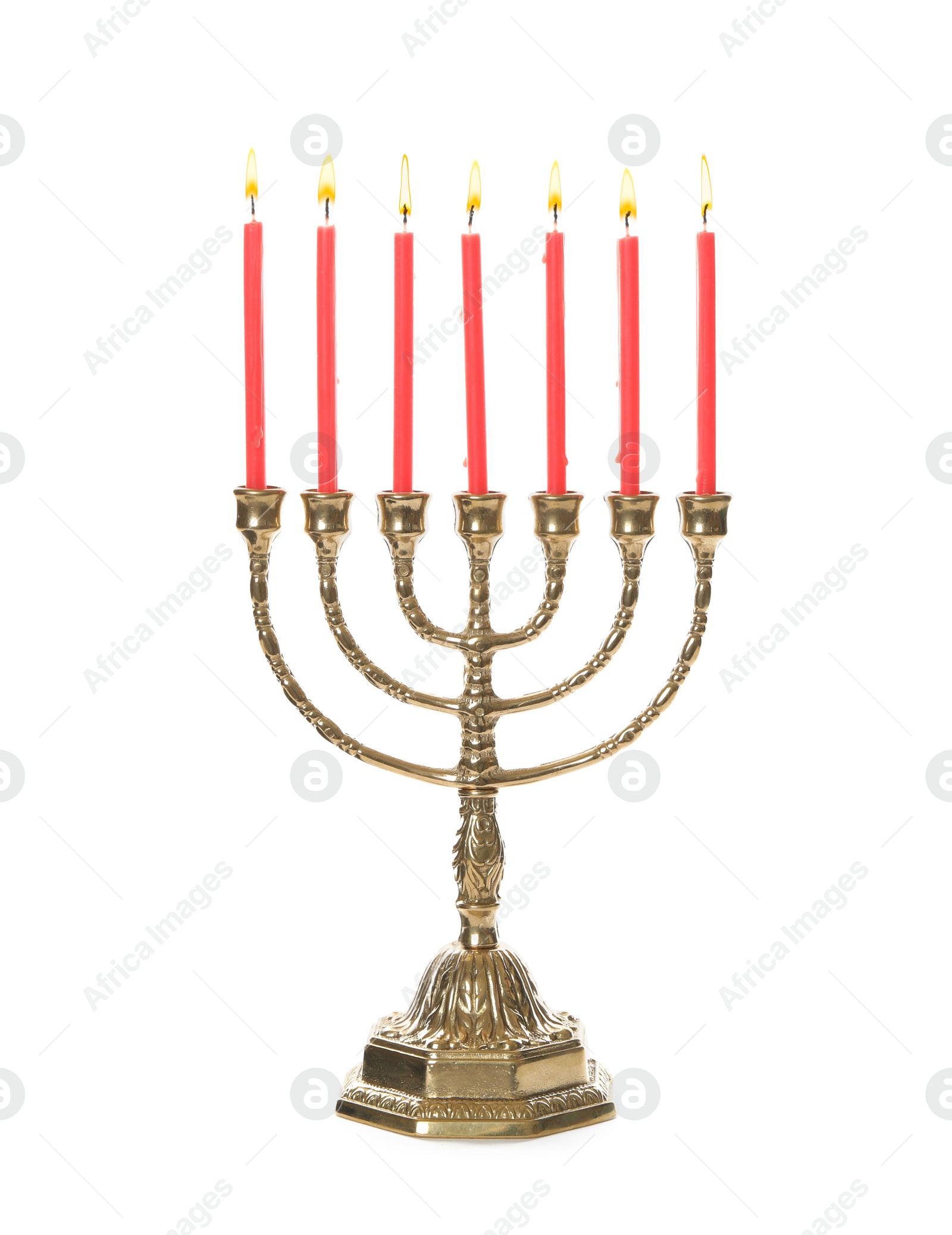 Photo of Golden menorah with burning candles on white background