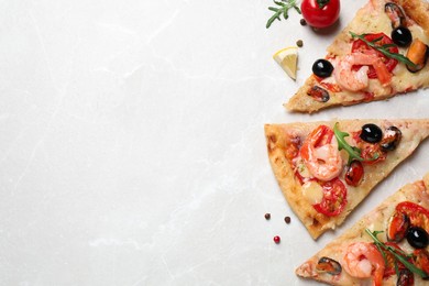 Photo of Tasty pizza with seafood and ingredients on light grey marble table, flat lay. Space for text