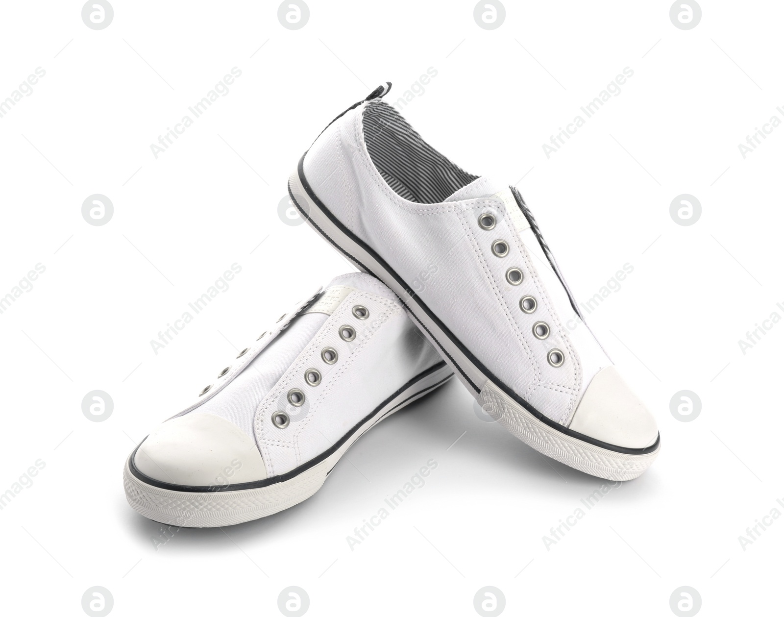 Photo of Pair of stylish sneakers on white background