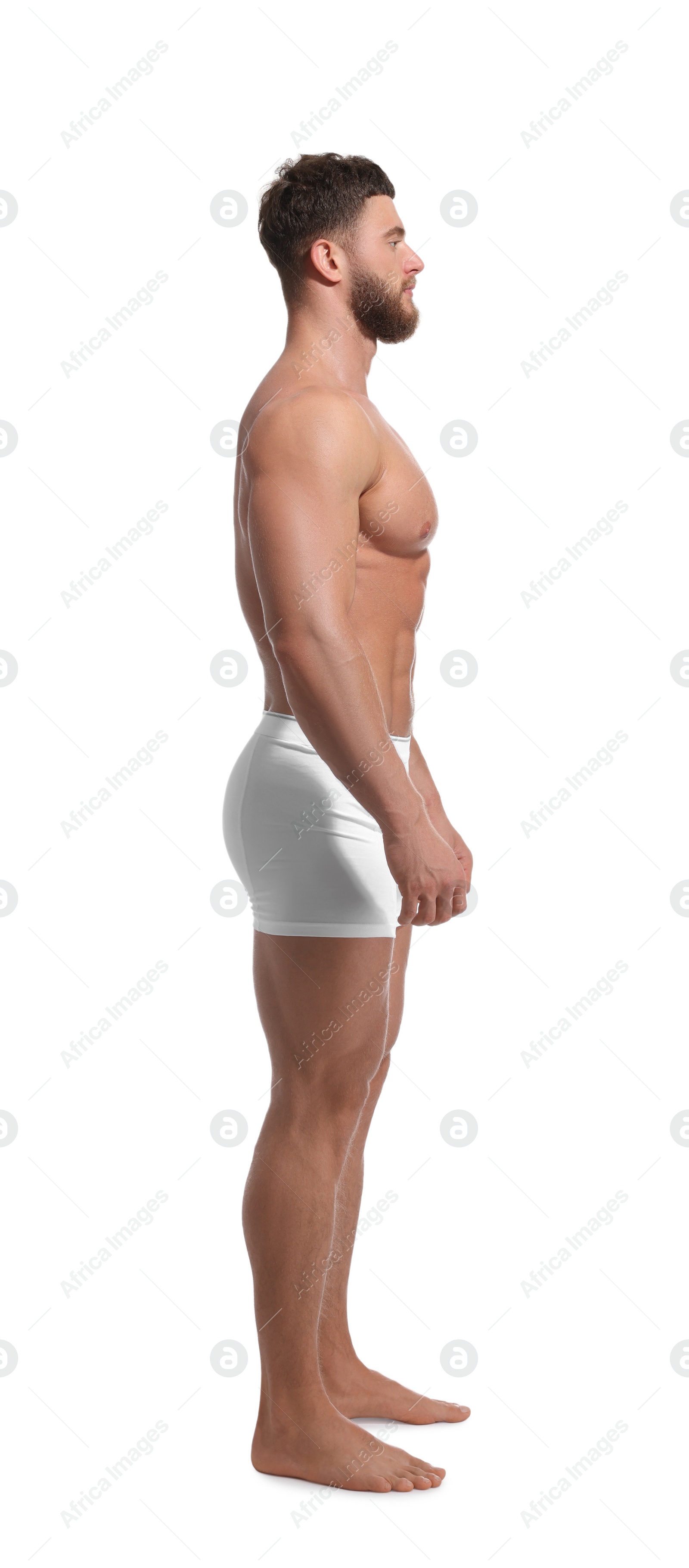 Photo of Handsome muscular man isolated on white. Sexy body