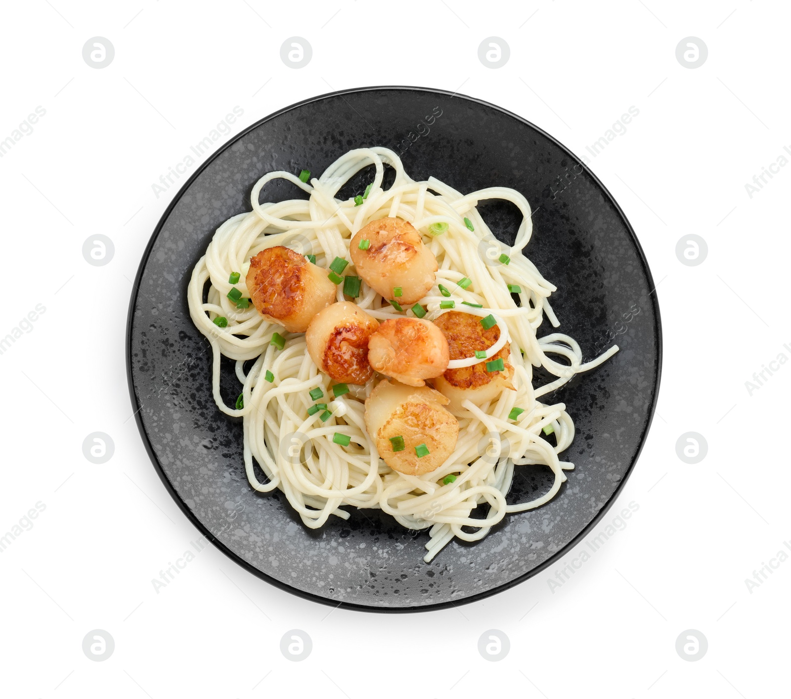 Photo of Delicious scallop pasta with green onion isolated on white, top view