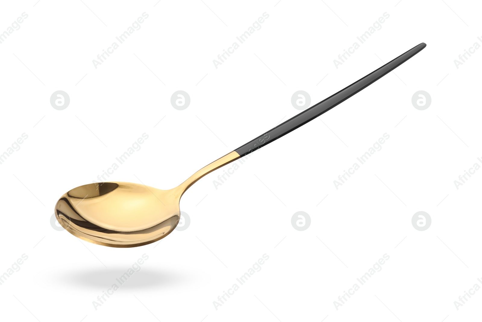 Image of Golden spoon in air isolated on white