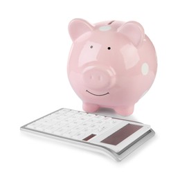 Calculator and pink piggy bank isolated on white