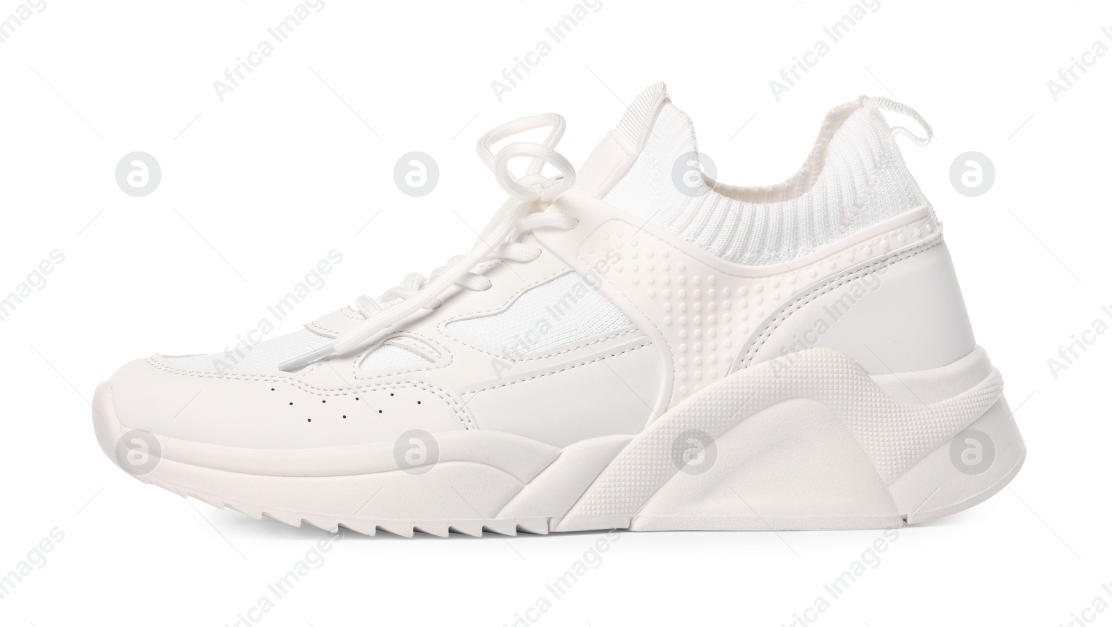 Photo of One stylish new sneaker isolated on white