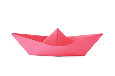 Photo of Red paper boat isolated on white. Origami art