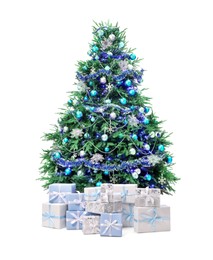 Photo of Beautiful Christmas tree and gift boxes isolated on white