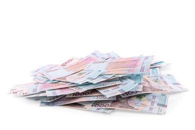 Photo of 1000 Ukrainian Hryvnia banknotes on white background