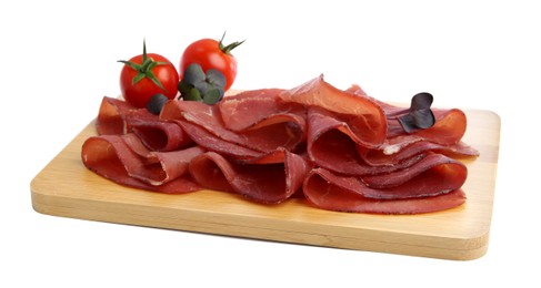 Photo of Slices of tasty bresaola and tomatoes isolated on white