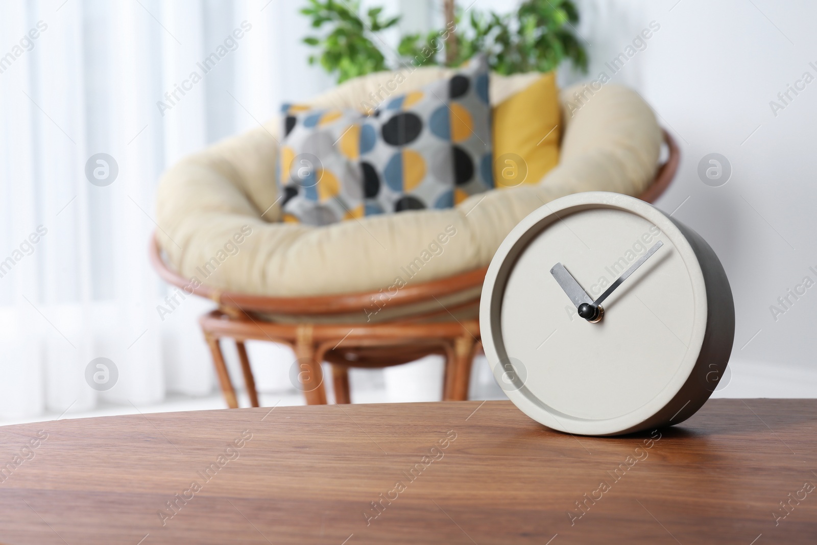 Photo of Analog clock on table indoors, space for text. Time management