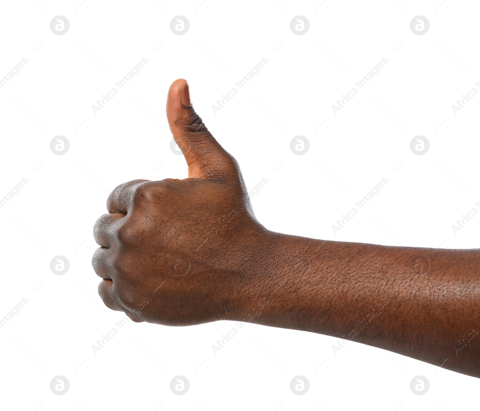 Photo of African-American man showing thumb up gesture on white background, closeup