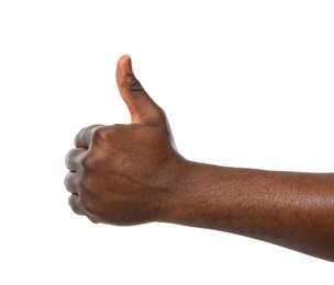 Photo of African-American man showing thumb up gesture on white background, closeup