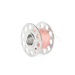 Photo of Metal spool of pink sewing thread isolated on white