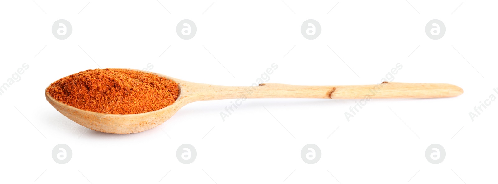 Photo of Spoon of ground pepper isolated on white