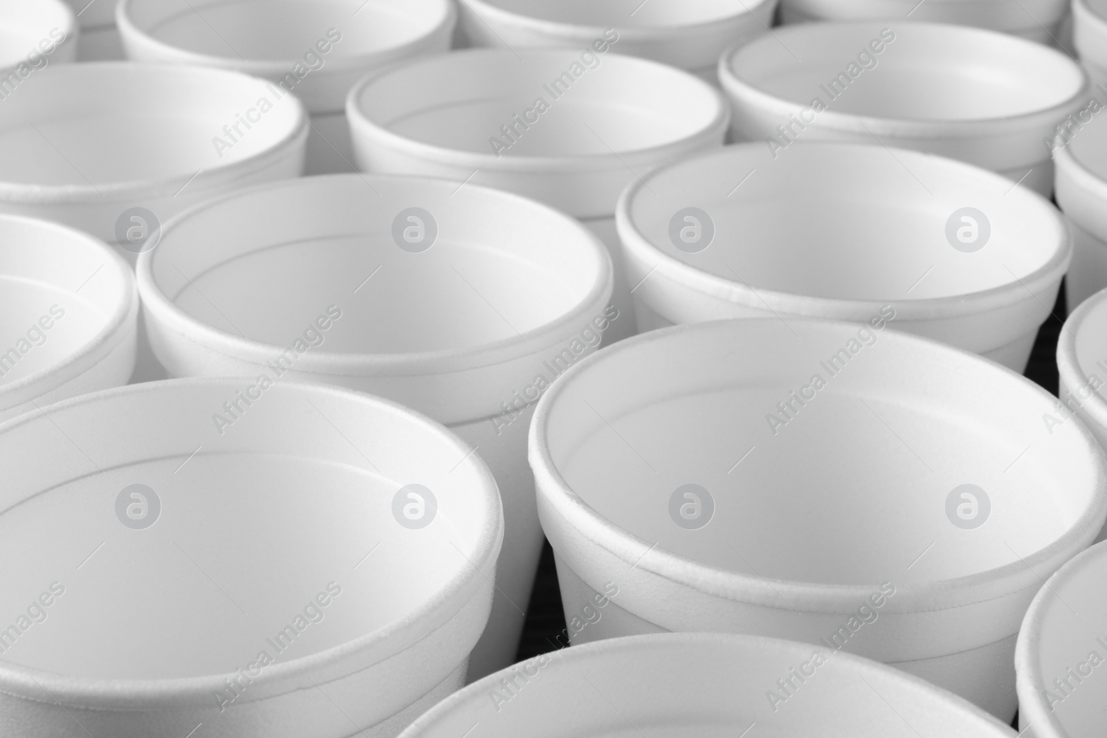 Photo of Closeup view of many white styrofoam cups