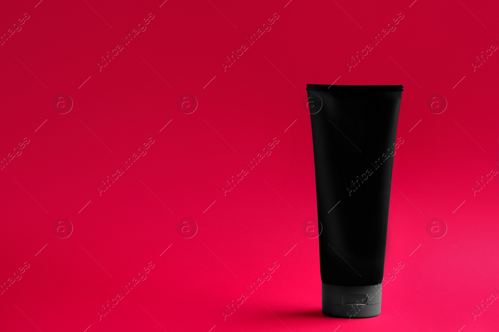 Photo of Men's cosmetic product on color background. Space for design